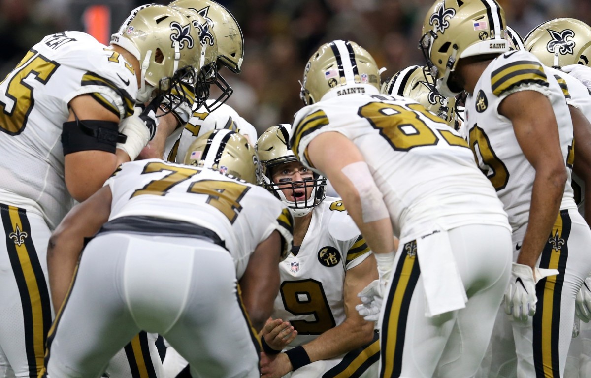 New Orleans, LA, USA; New Orleans Saints quarterback Drew Brees (9) calls a play in the huddle in the second quarter against the Philadelphia Eagles at the Mercedes-Benz Superdome. Mandatory Credit: Chuck Cook-USA TODAY 