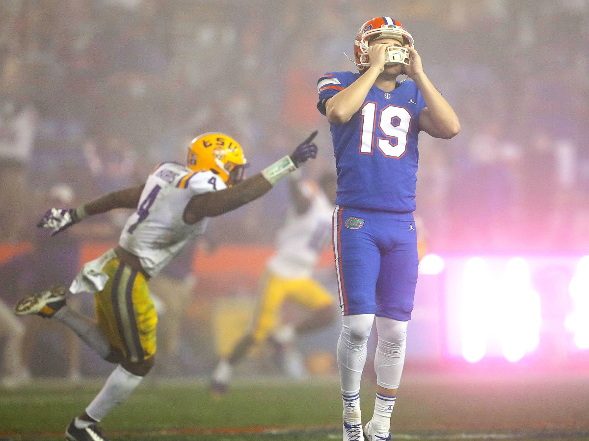 Florida kicker Evan McPherson reacts after missing the game-tying field goal attempt.