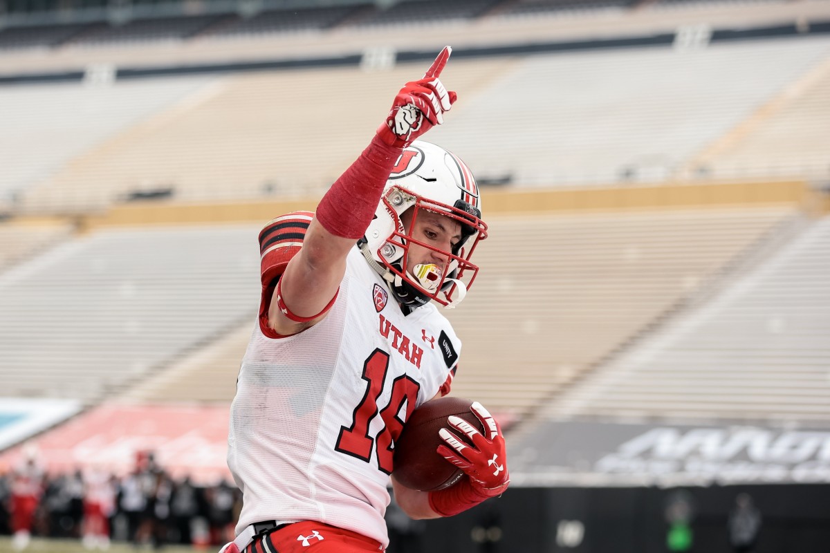 Dec 12, 2020; Boulder, Colorado, USA; Utah Utes wide receiver Britain Covey (18) celebrates after scoring a touchdown against the Colorado Buffaloes in the third quarter at Folsom Field.