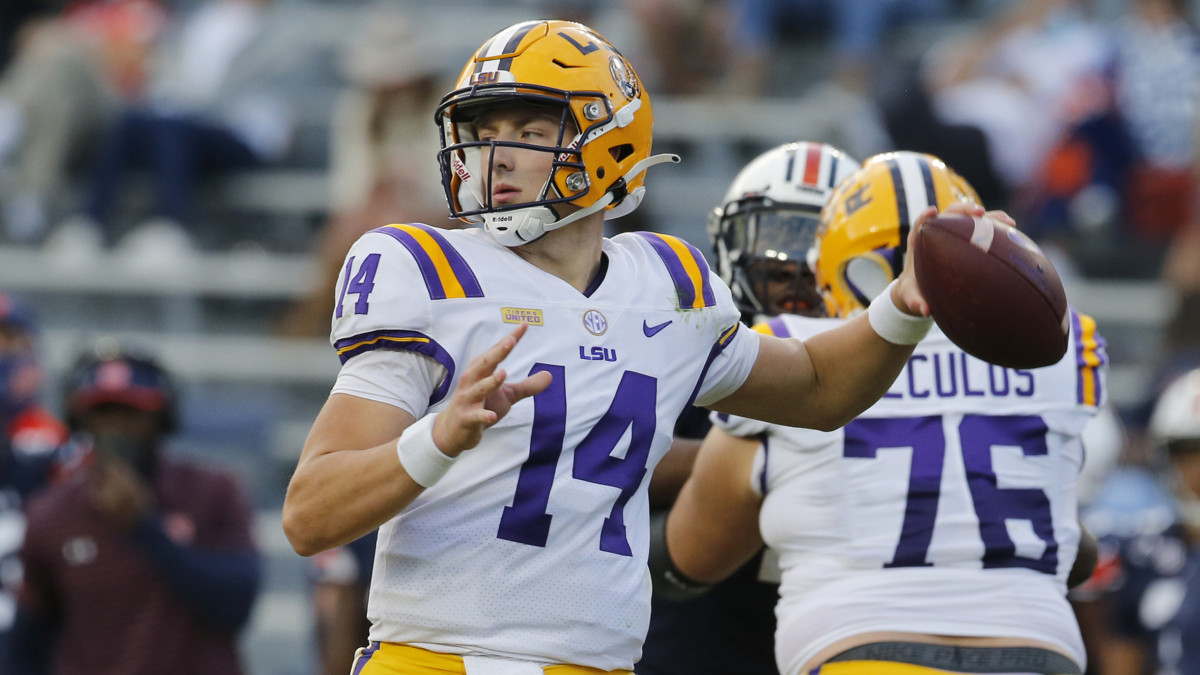 SU Tigers quarterback Max Johnson (14) looks for a receiver against the Auburn Tigers during the third quarter at Jordan-Hare Stadium.