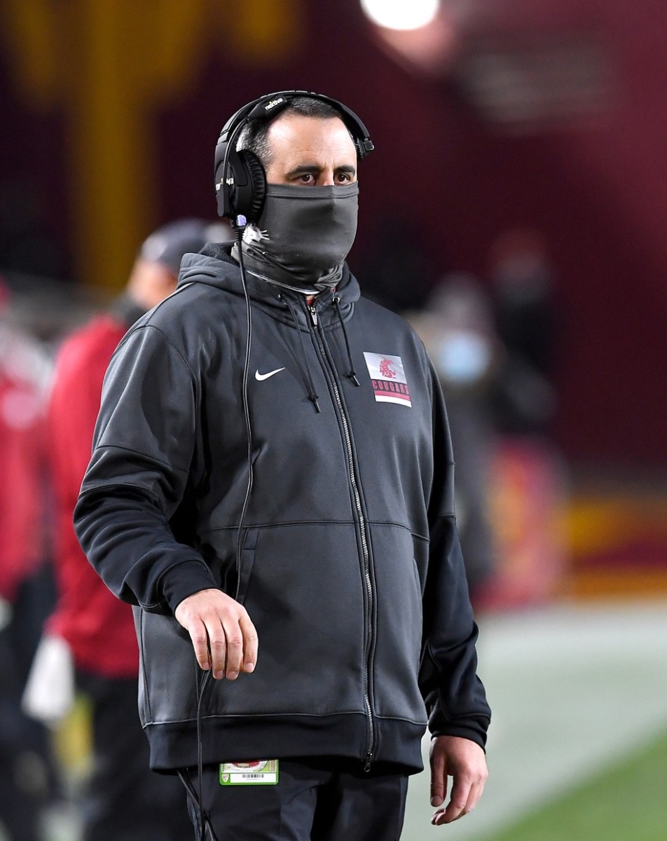 Dec 6, 2020; Los Angeles, California, USA; Washington State Cougars head coach Nick Rolovich looks on from the sidelines in the first half against the USC Trojans at United Airlines Field at the Los Angeles Memorial Coliseum.