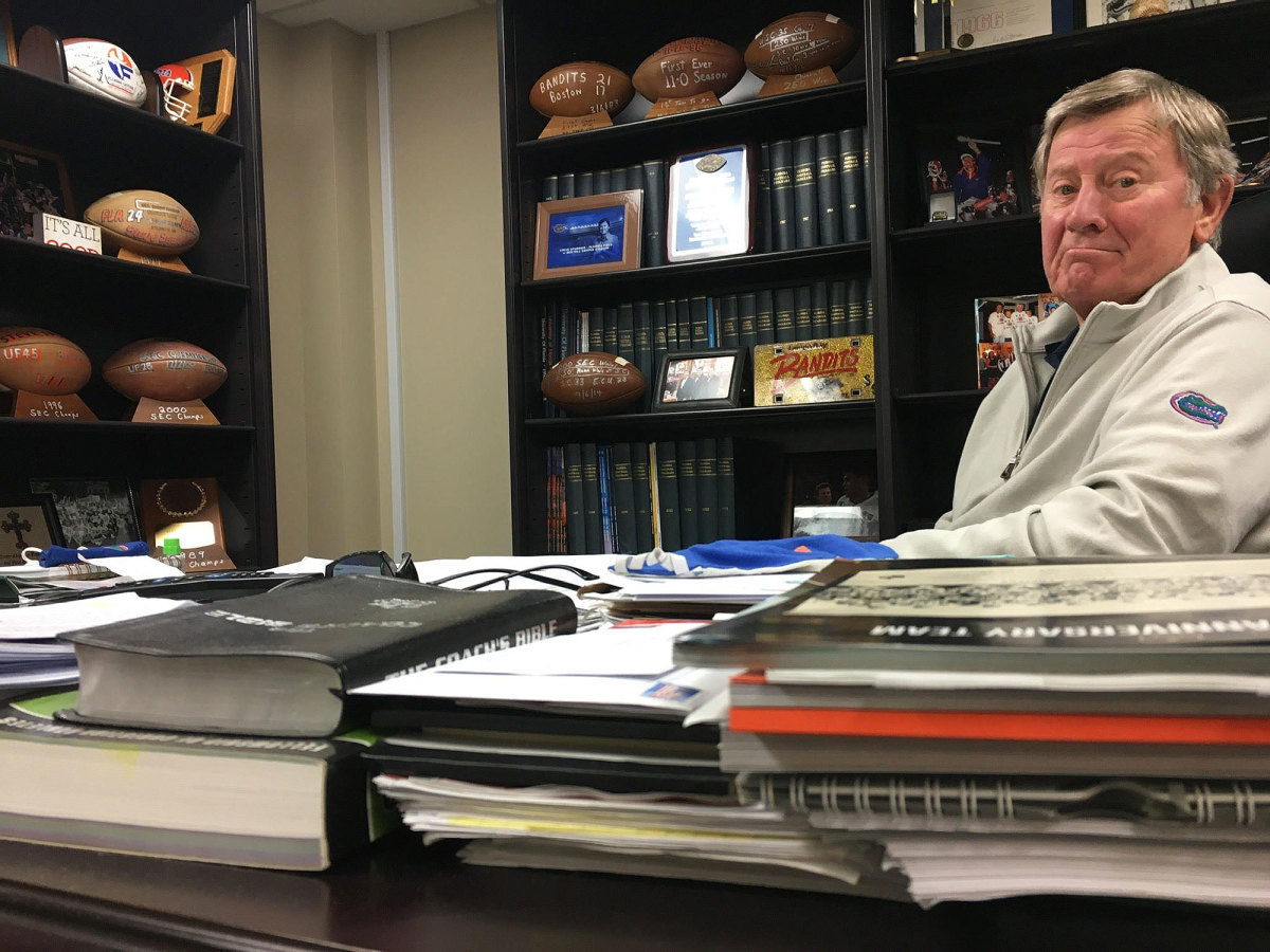 Steve Spurrier at his desk