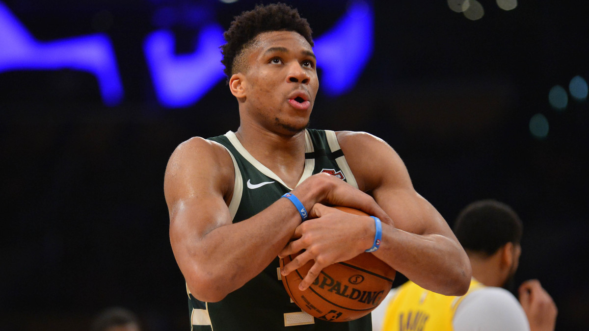 Milwaukee Bucks forward Giannis Antetokounmpo (34) reacts against the Los Angeles Lakers during the second half at Staples Center.