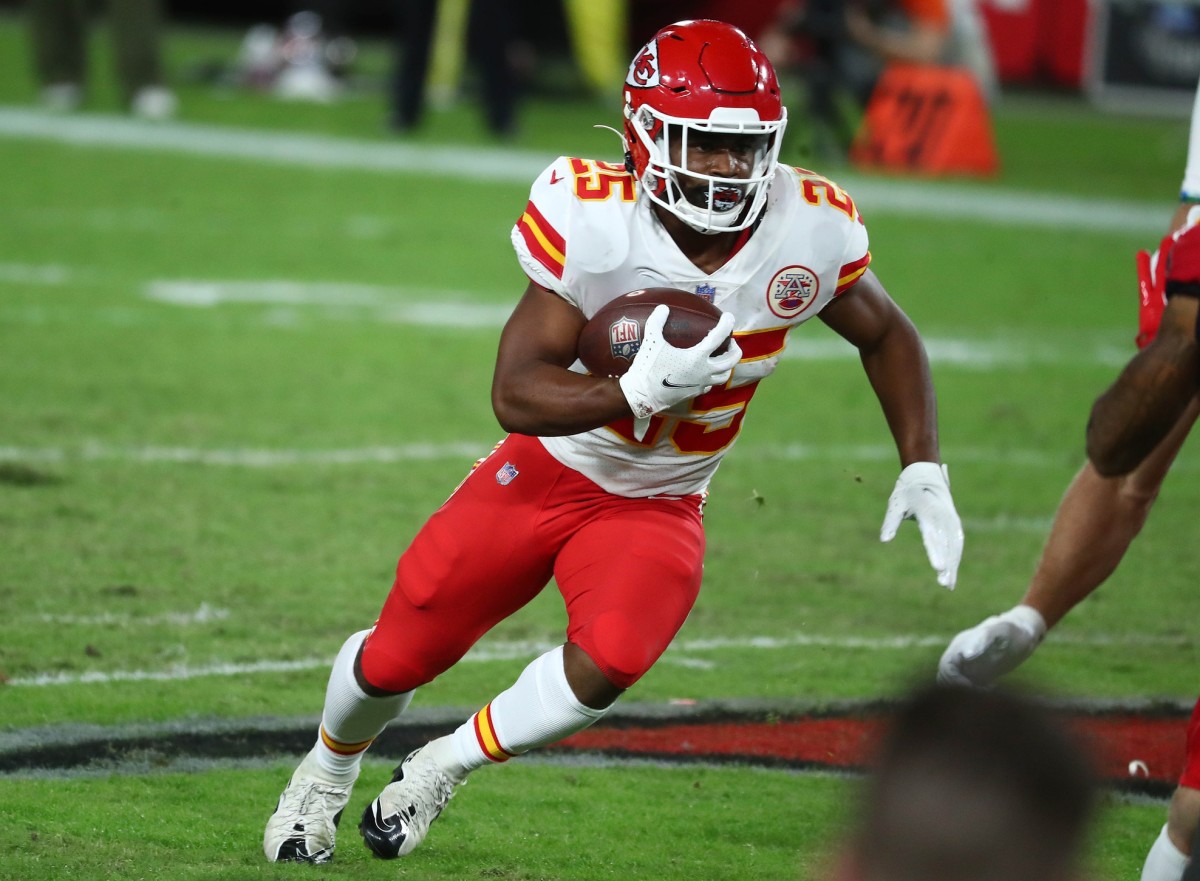 Nov 29, 2020; Tampa, Florida, USA; Kansas City Chiefs running back Clyde Edwards-Helaire (25) runs the ball against the Tampa Bay Buccaneers during the second half at Raymond James Stadium. Mandatory Credit: Kim Klement-USA TODAY 