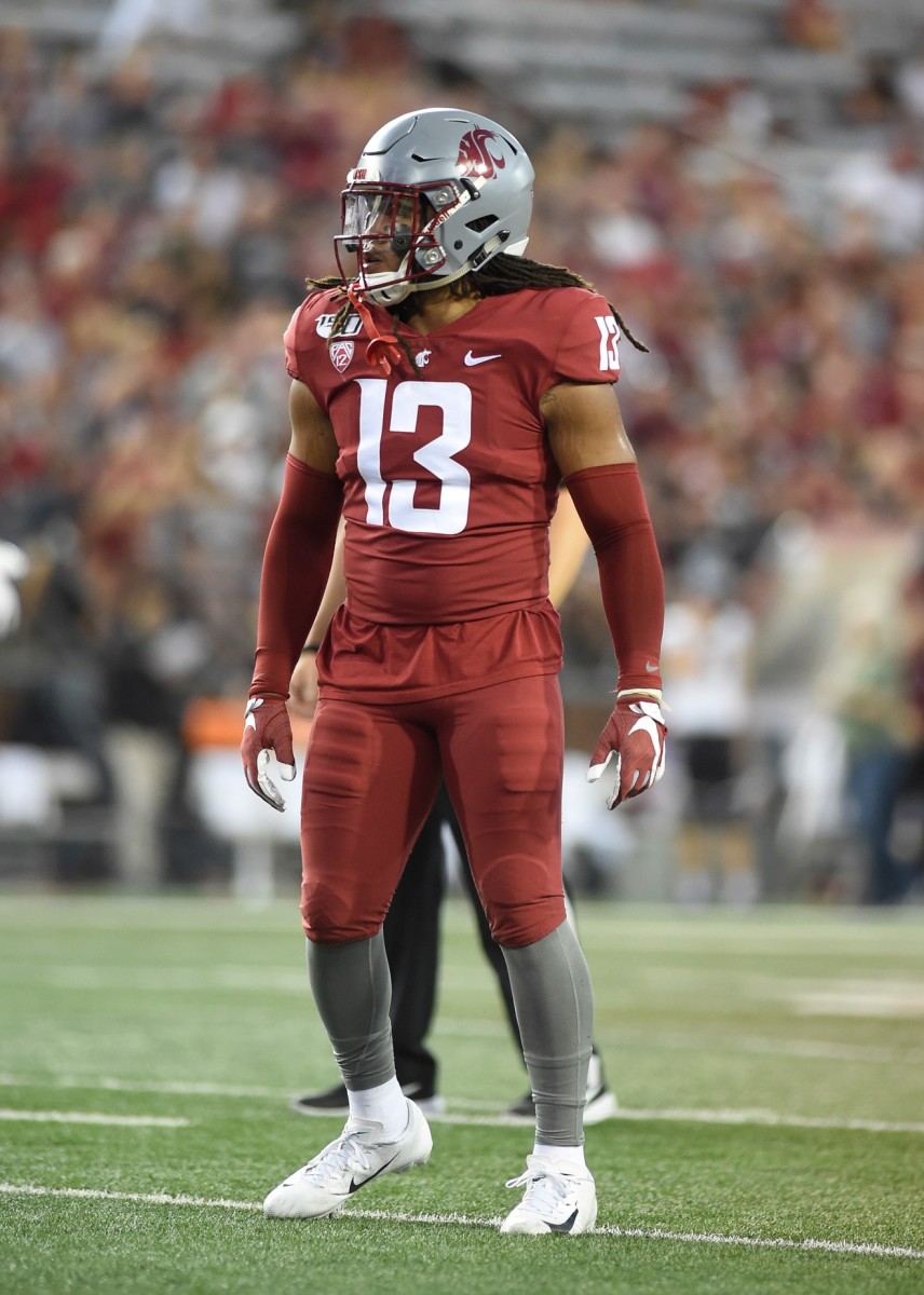 Aug 31, 2019; Pullman, WA, USA; Washington State Cougars linebacker Jahad Woods (13) lines up for a play during a football game against the New Mexico State Aggies in the first half at Martin Stadium.