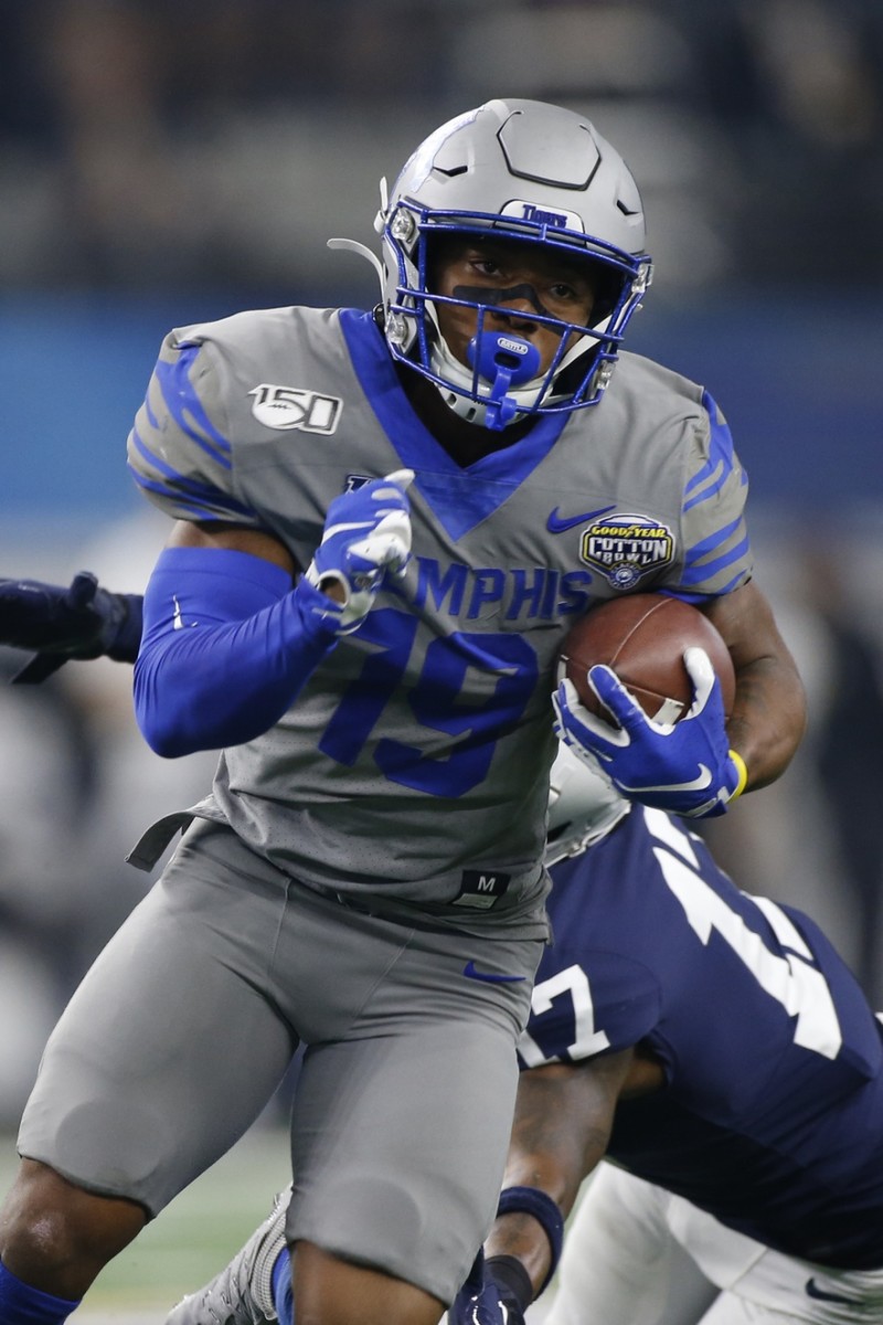 Dec 28, 2019; Arlington, Texas, USA; Memphis Tigers running back Kenneth Gainwell (19) runs the ball in the first quarter against the Penn State Nittany Lions at AT&T Stadium. Mandatory Credit: Tim Heitman-USA TODAY Sports