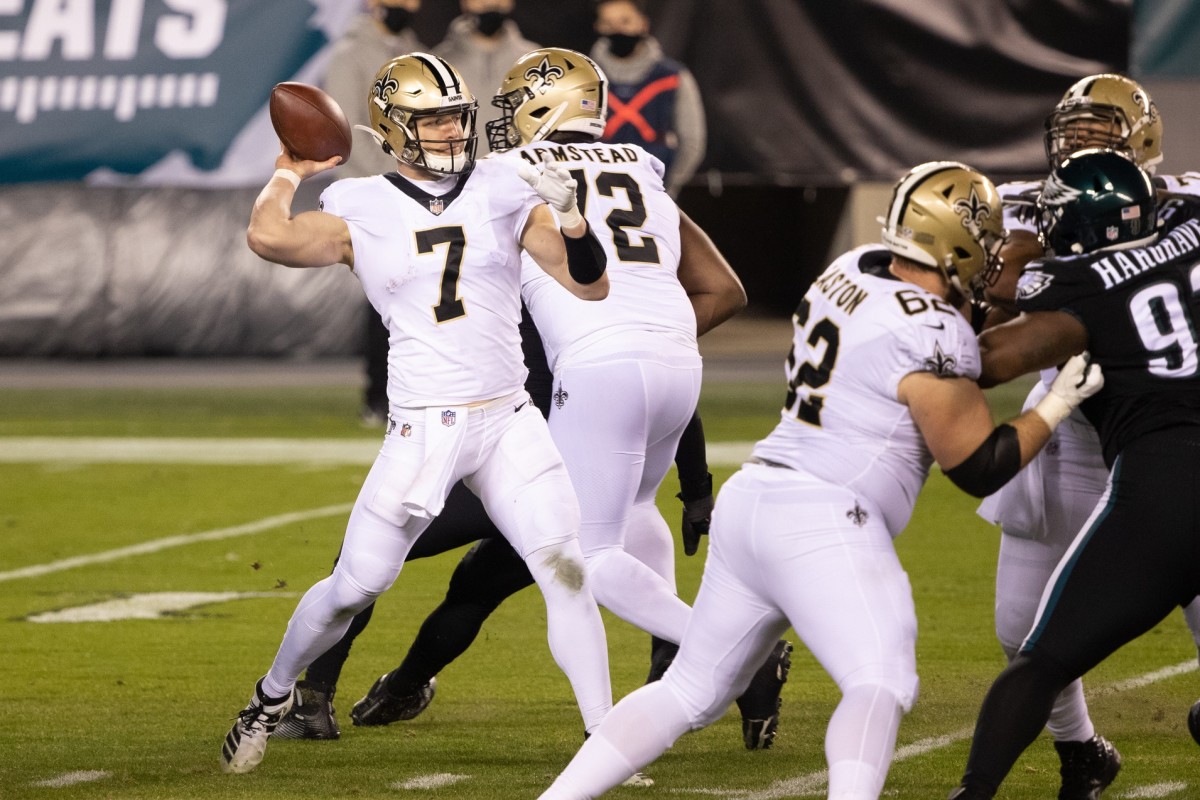Dec 13, 2020; Philadelphia, Pennsylvania, USA; New Orleans Saints quarterback Taysom Hill (7) passes the ball against the Philadelphia Eagles during the second quarter at Lincoln Financial Field. Mandatory Credit: Bill Streicher-USA TODAY
