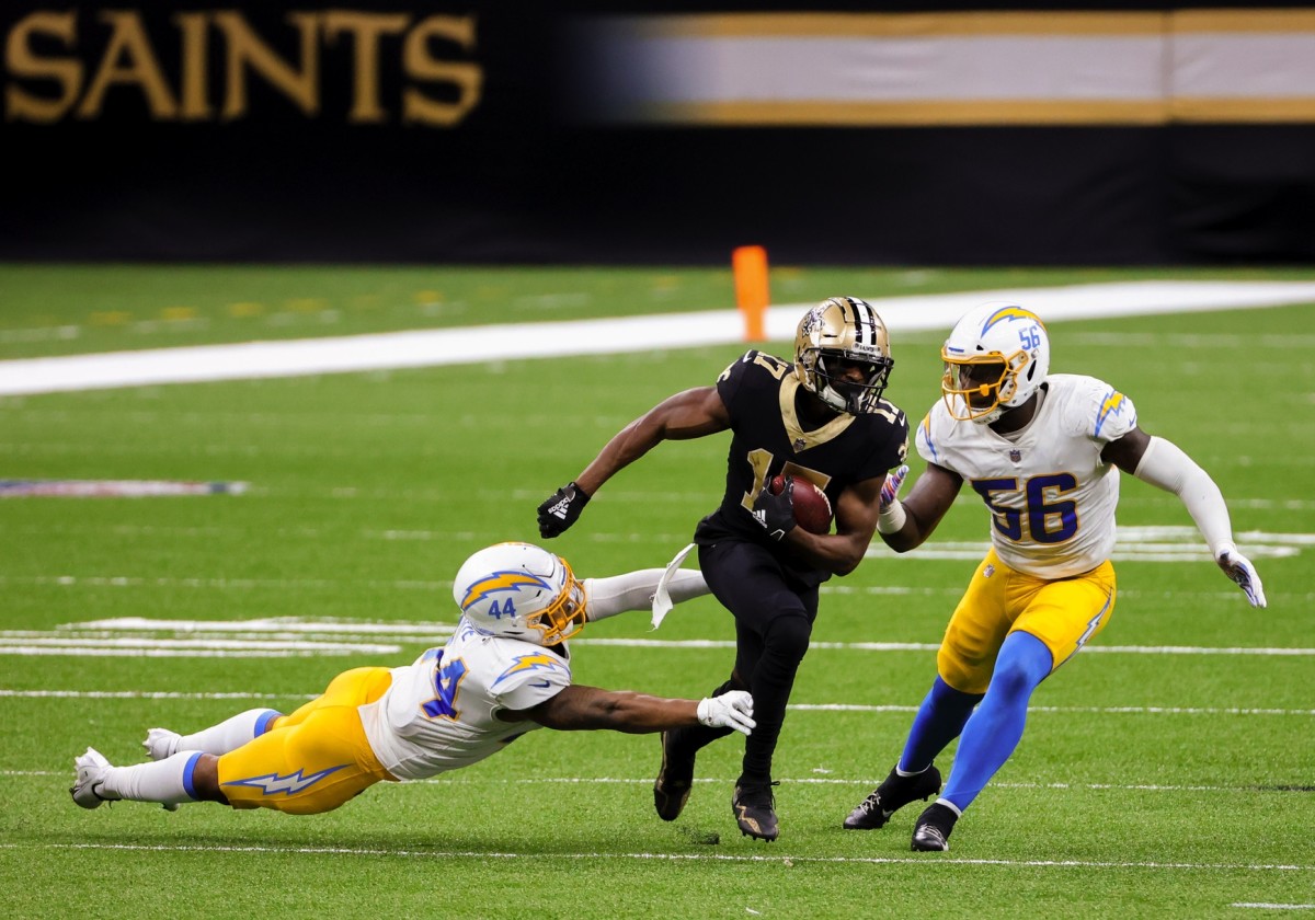 Oct 12, 2020; New Orleans, Louisiana, USA; New Orleans Saints wide receiver Emmanuel Sanders (17) runs past Los Angeles Chargers linebacker Kyzir White (44) and linebacker Kenneth Murray Jr. (56) during the second half at the Mercedes-Benz Superdome. Mandatory Credit: Derick E. Hingle-USA TODAY Sports