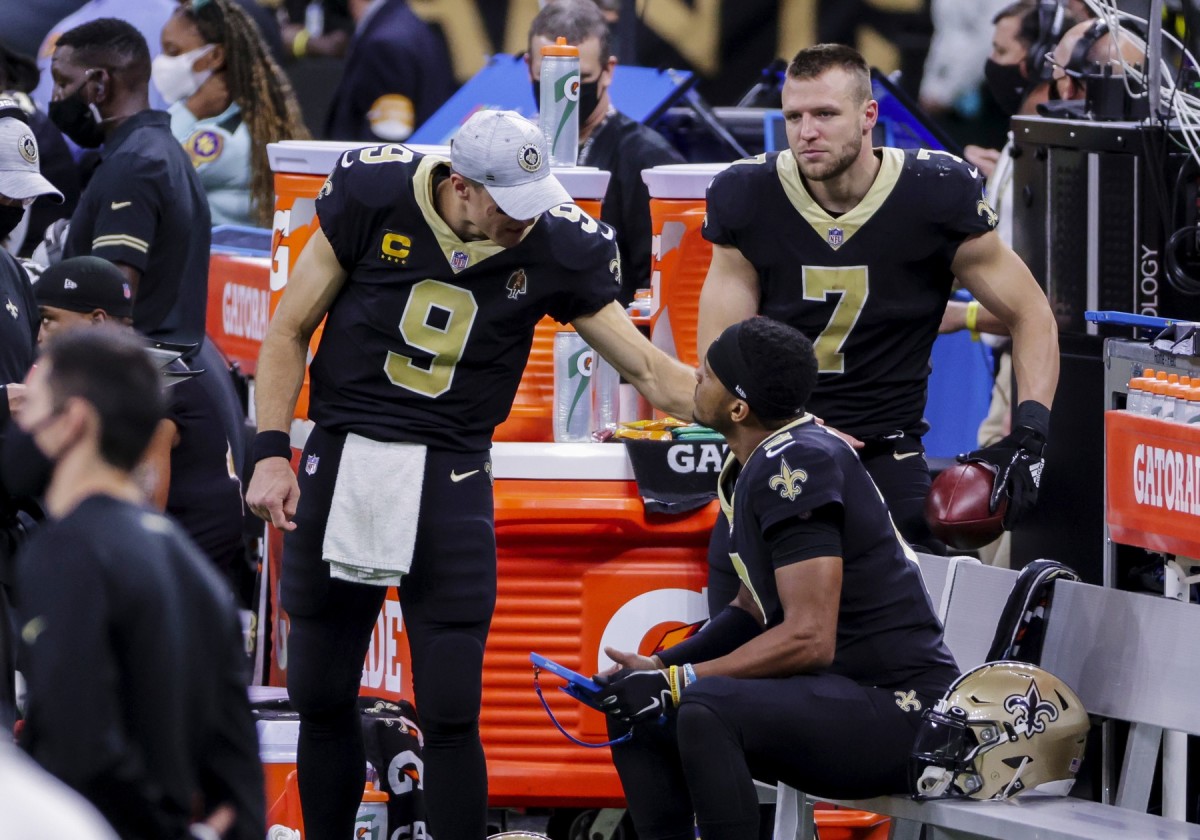 Nov 15, 2020; New Orleans, Louisiana, USA; New Orleans Saints quarterback Drew Brees (9) talks with quarterback Jameis Winston (2) after leaving the game with a injury during the second half against the San Francisco 49ers at the Mercedes-Benz Superdome. Mandatory Credit: Derick E. Hingle-USA TODAY Sports