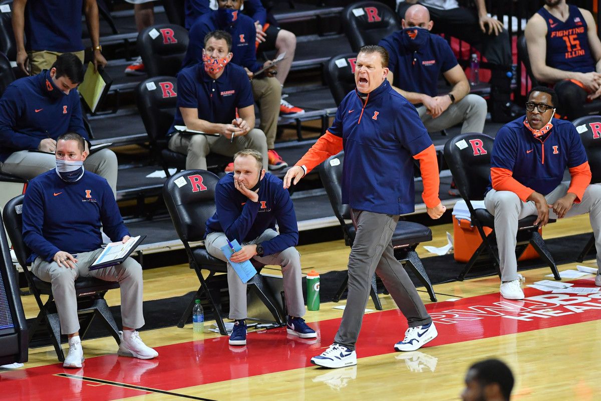Illinois Fighting Illini head coach Brad Underwood (standing) reacts during a Dec. 20 game against the Rutgers Scarlet Knights during the first half at Rutgers Athletic Center.