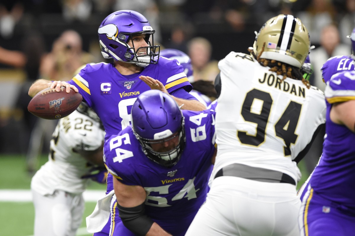 Jan 5, 2020; New Orleans, Louisiana, USA; Minnesota Vikings quarterback Kirk Cousins (8) throws the ball against New Orleans Saints defensive end Cameron Jordan (94) during the second quarter of a NFC Wild Card playoff football game at the Mercedes-Benz Superdome. Mandatory Credit: John David Mercer-USA TODAY