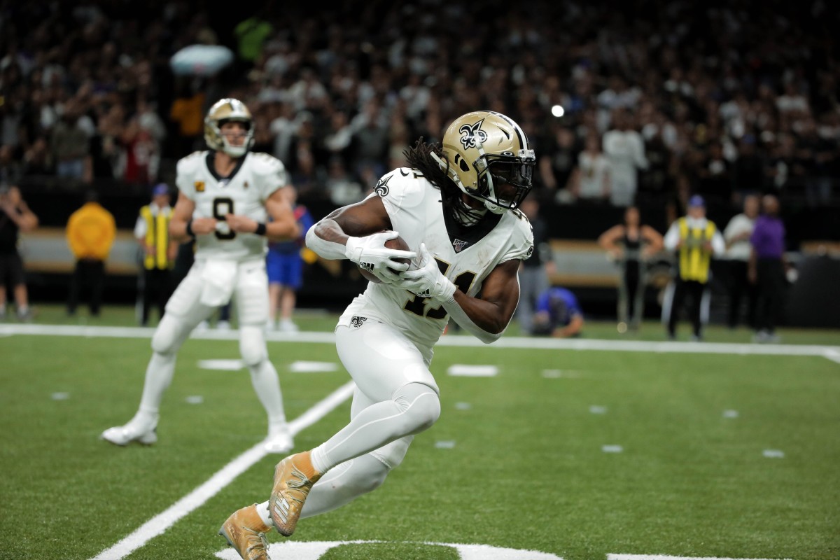 Jan 5, 2020; New Orleans, Louisiana, USA; New Orleans Saints running back Alvin Kamara (41) runs for a touchdown against the Minnesota Vikings during the second quarter of a NFC Wild Card playoff football game at the Mercedes-Benz Superdome. Mandatory Credit: Derick Hingle-USA TODAY 