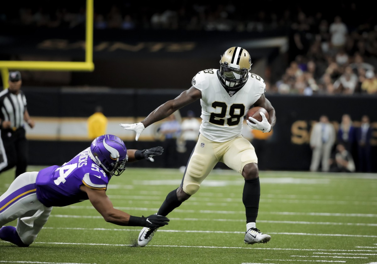 Aug 9, 2019; New Orleans, LA, USA; New Orleans Saints running back Latavius Murray (28) runs past Minnesota Vikings middle linebacker Eric Kendricks (54) during the first quarter at the Mercedes-Benz Superdome. Mandatory Credit: Derick E. Hingle-USA TODAY 