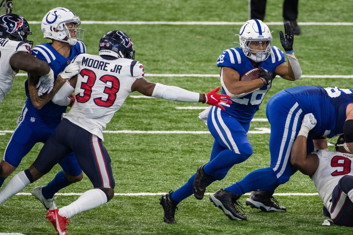 Indianapolis Colts rookie running back Jonathan Taylor cuts through the Houston Texans defense in a Week 15 home win.
