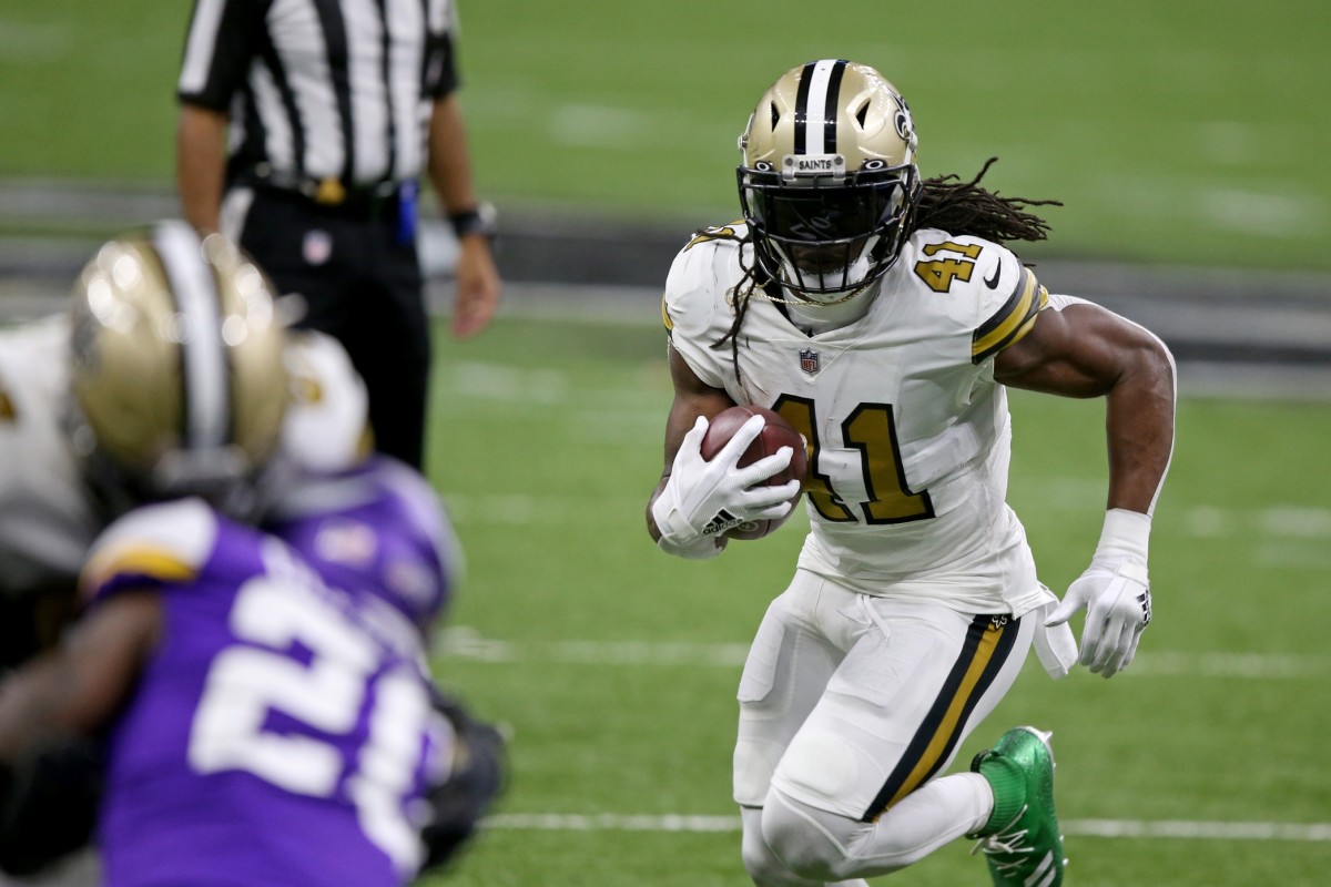 Dec 25, 2020; New Orleans, Louisiana, USA; New Orleans Saints running back Alvin Kamara (41) runs against the Minnesota Vikings in the second quarter at the Mercedes-Benz Superdome. Mandatory Credit: Chuck Cook-USA TODAY 