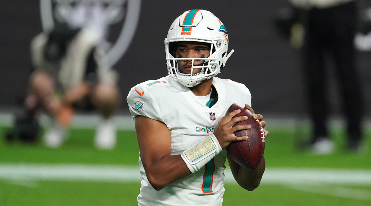 Tua Tagovailoa drops back to pass for the Dolphins.
