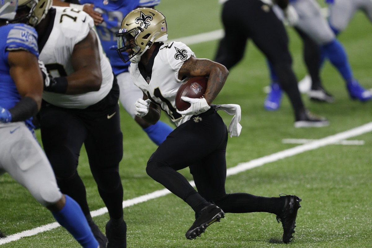 Oct 4, 2020; Detroit, Michigan, USA; New Orleans Saints wide receiver Deonte Harris (11) runs the ball against the Detroit Lions during the first quarter at Ford Field. Mandatory Credit: Raj Mehta-USA TODAY