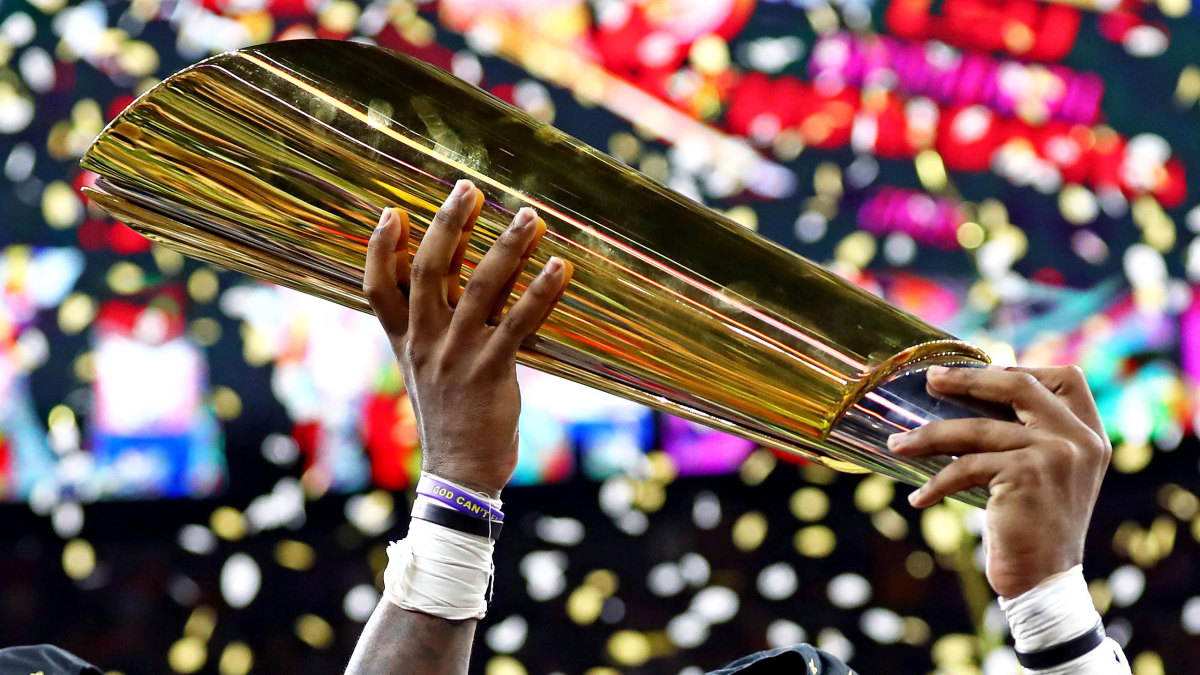 The college football national championship trophy is lifted