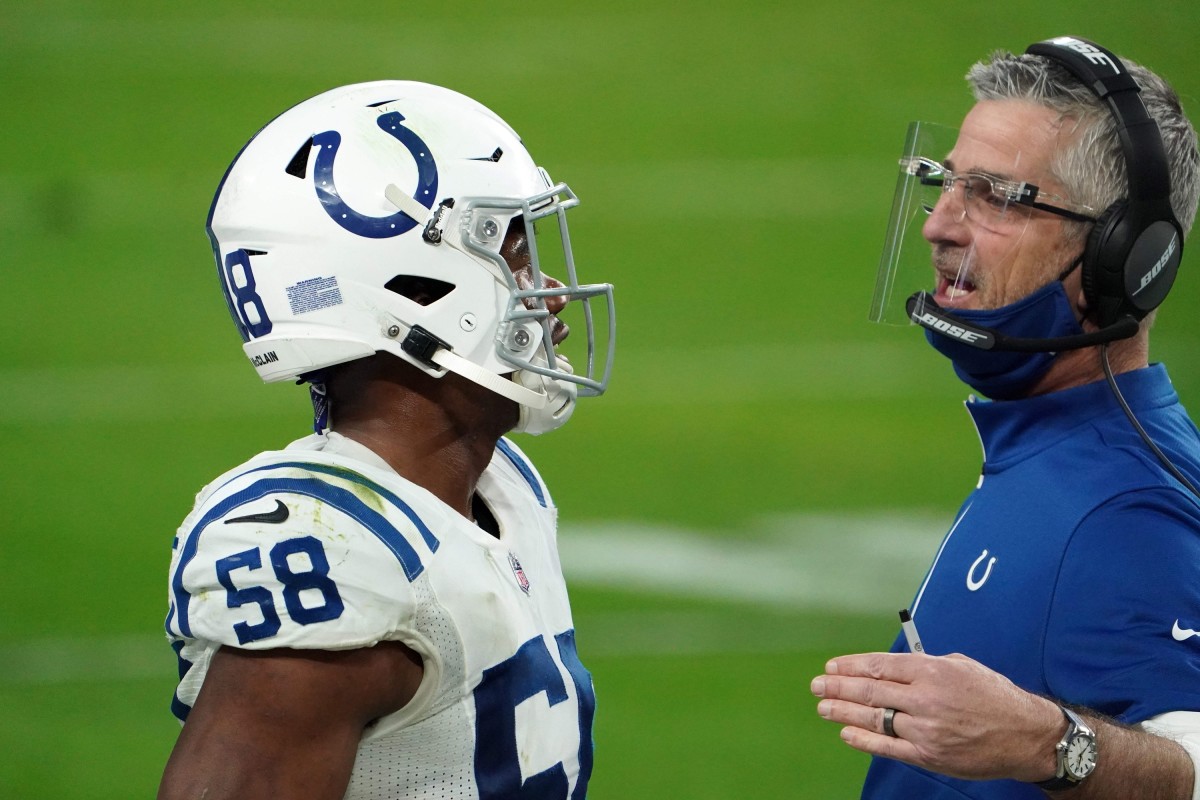Indianapolis Colts linebacker Bobby Okereke (left) talks to head coach Frank Reich during a Week 15 road win at Las Vegas.