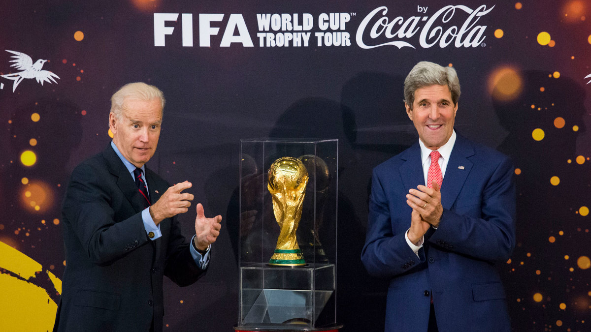Joe Biden and John Kerry with the World Cup trophy