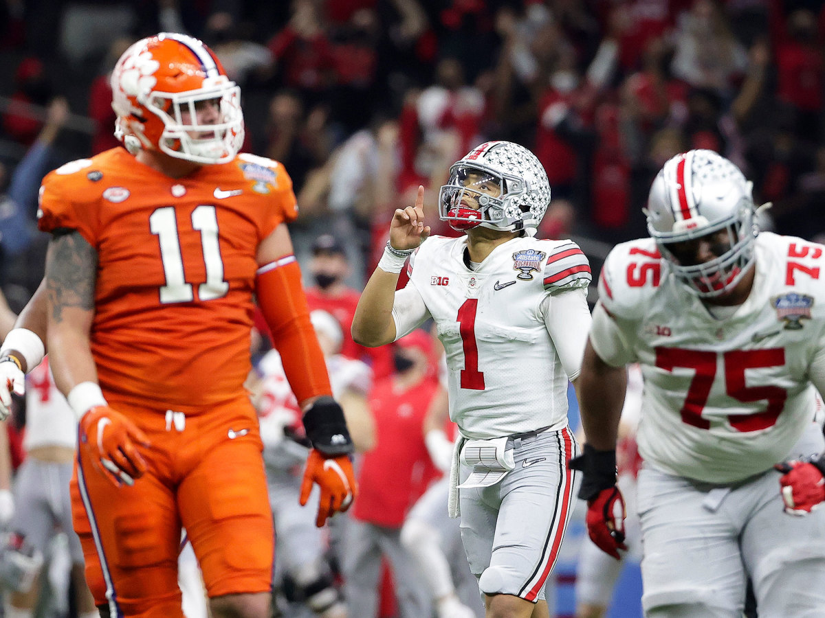 Justin Fields points to the sky after scoring a touchdown vs. Clemson