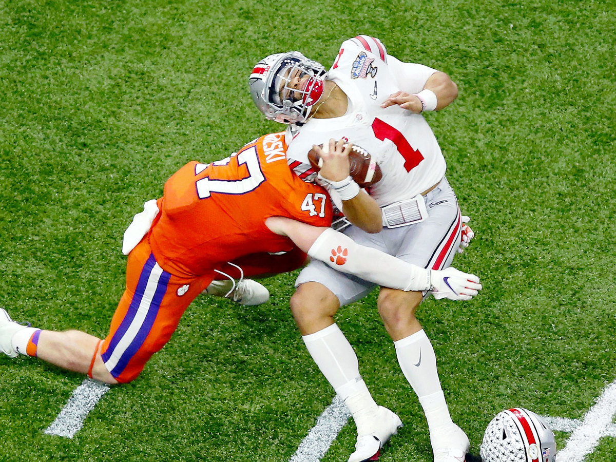 Clemson's James Skalski hits Justin Fields with a tackle that earned a targeting ejection