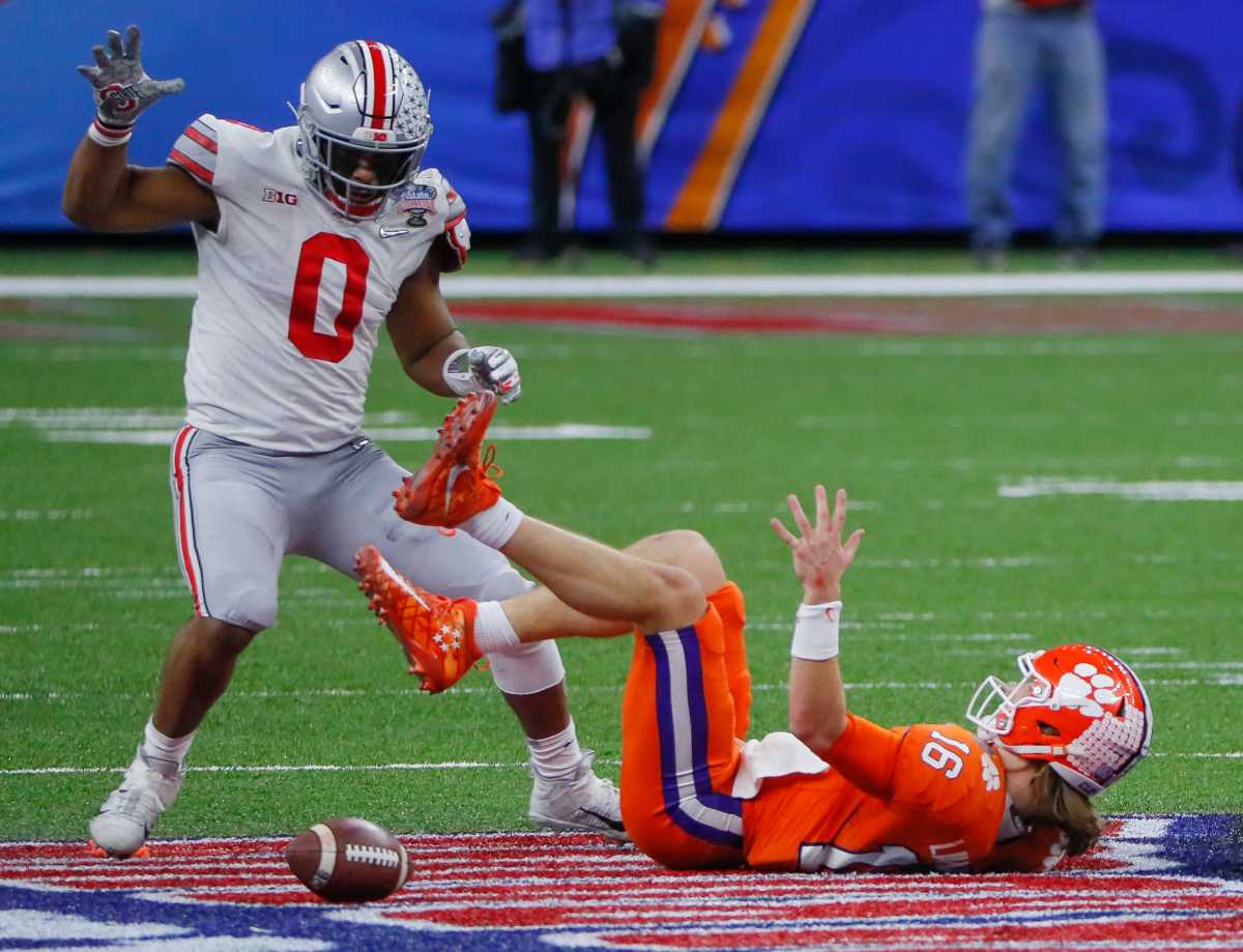 Ohio State sent pressure all night and Lawrence's offensive line couldn't keep him protected. © Adam Cairns/Columbus Dispatch via Imagn Content Services, LLC