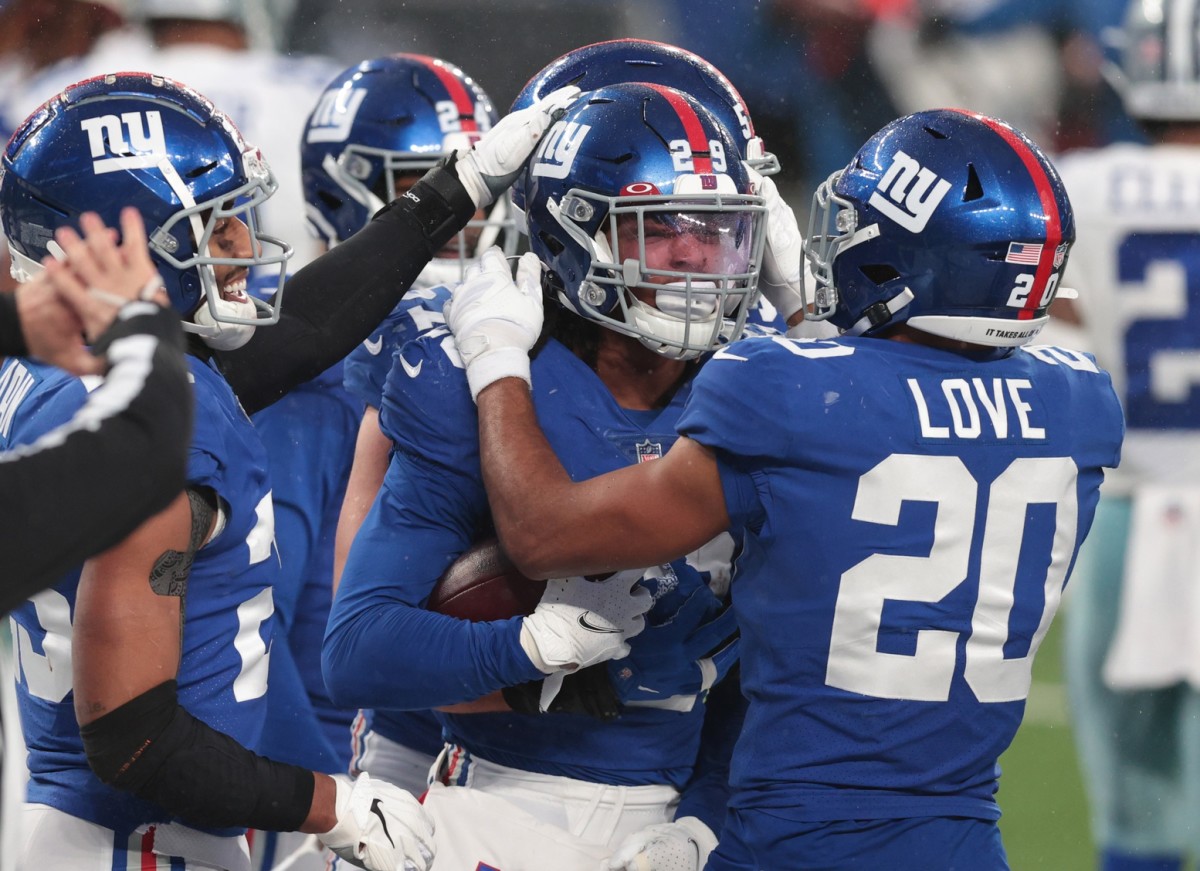 Jan 3, 2021; East Rutherford, NJ, USA; New York Giants safety Xavier McKinney (29) celebrates an interception against the Dallas Cowboys in the second half at MetLife Stadium.