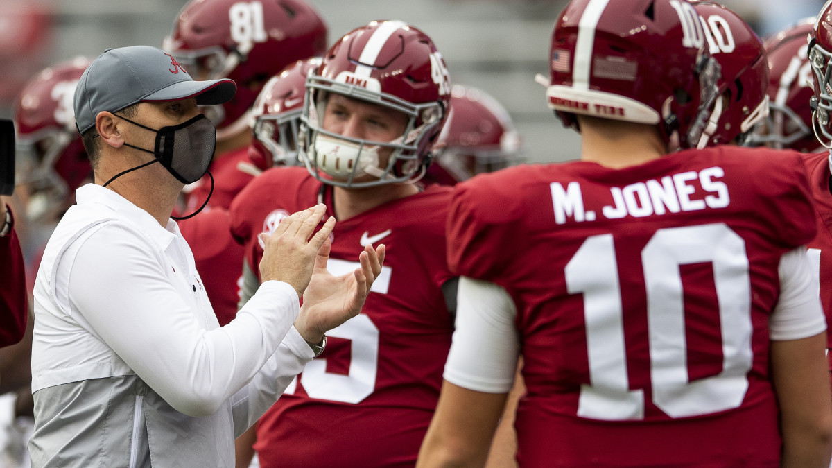 Alabama offensive coordinator Steve Sarkisian, acting as head coach during head coach Nick Saban's COVID-19 quarantine, takes the field with the team for warmups at Bryant-Denny Stadium for the Iron Bowl