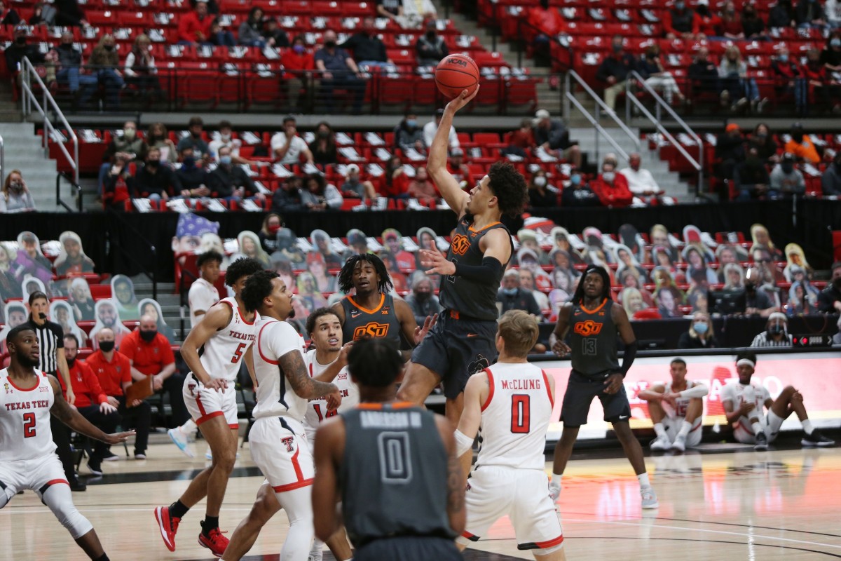 Oklahoma State Cowboys guard Cade Cunningham (2) goes to the basket against the Texas Tech Red Raiders in the first half at United Supermarkets Arena.