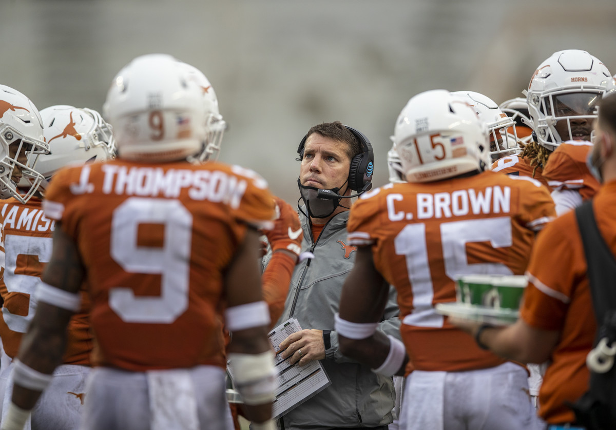 Texas Longhorns defensive coordinator Chris Ash looks on during a timeout late in the fourth quarter against Iowa State Cyclones during NCAA college football game at Darrell K Royal-Texas Memorial Stadium.