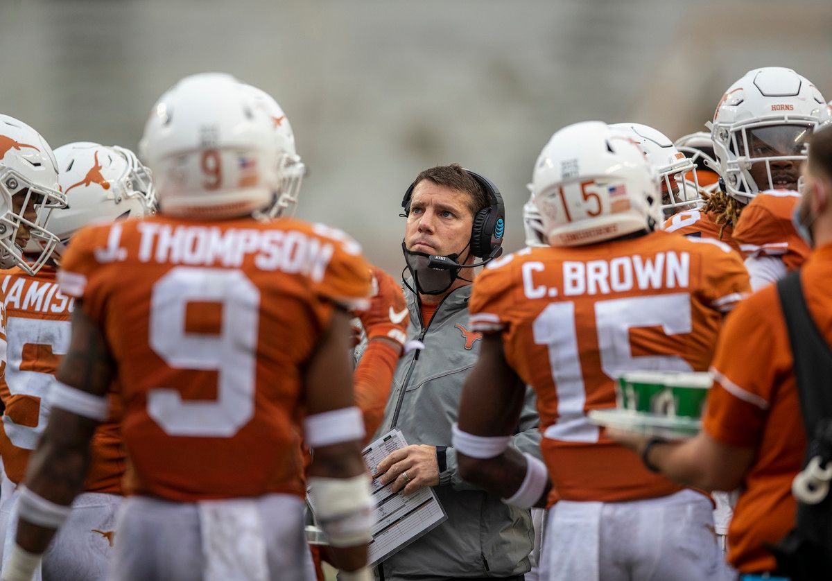 Texas Longhorns defensive coordinator Chris Ash looks on during a timeout late in the fourth quarter against Iowa State Cyclones during NCAA college football game at Darrell K Royal-Texas Memorial Stadium.