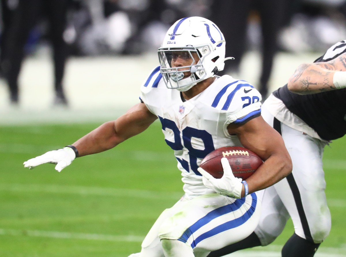 Indianapolis Colts rookie running back Jonathan Taylor looks for open space in a road win at Las Vegas.
