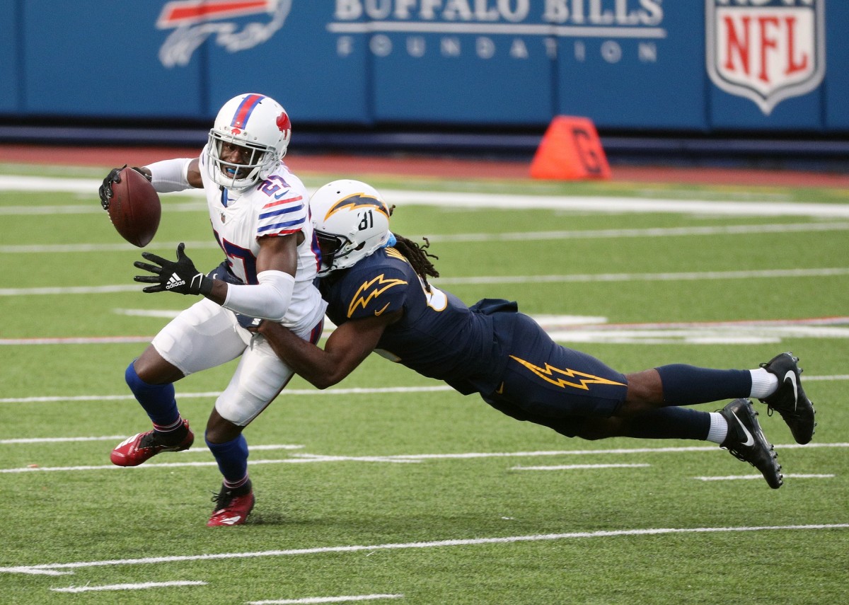Bills cornerback Tre'Davious White intercepts a pass intended for Los Angeles Chargers receiver Mike Williams during their 2020 matchup.