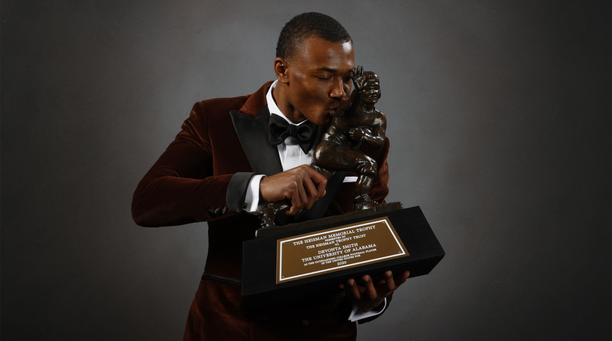 How many Heisman Trophy winners have won a national title? - Sports