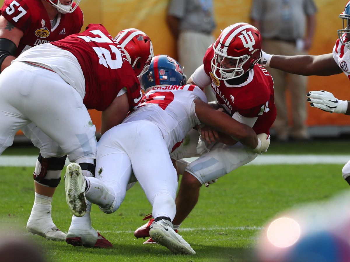 Mississippi Rebels defensive lineman Ryder Anderson (89) sacks Indiana Hoosiers quarterback Jack Tuttle (14) during the first half at Raymond James Stadium.