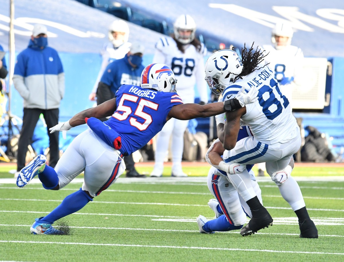 Indianapolis Colts tight end Mo Alie-Cox (81) is tackled by Buffalo Bills defensive end Jerry Hughes (55) in the third quarter at Bills Stadium.