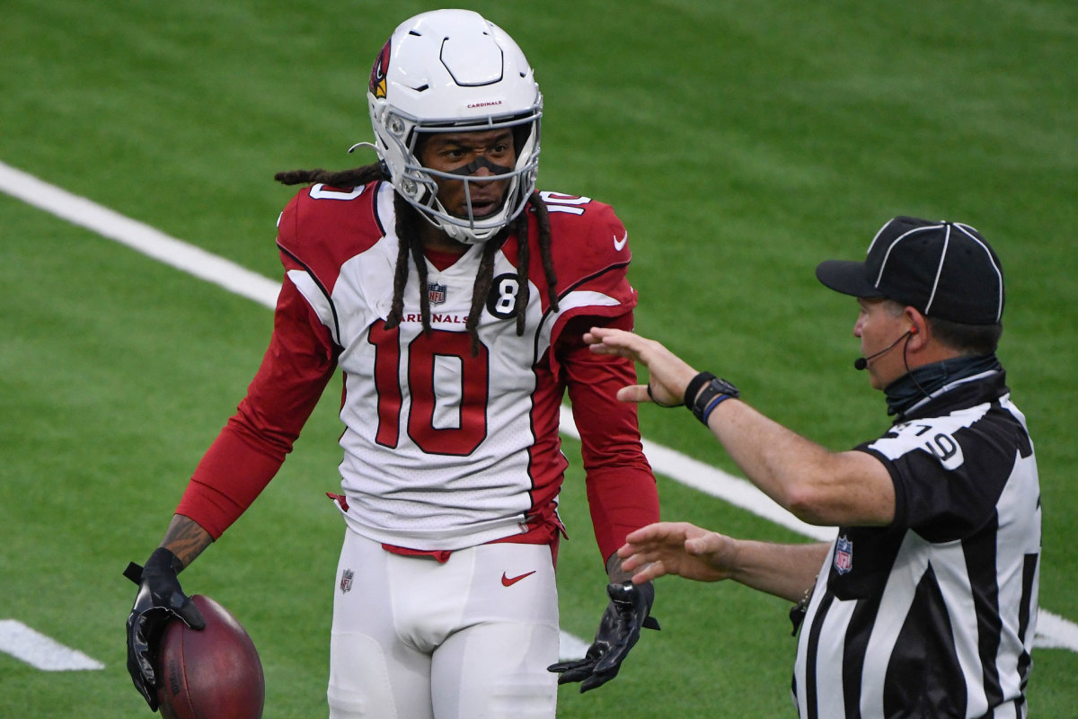 Arizona Cardinals wide receiver DeAndre Hopkins (10) argues with referee Michael Banks (19) after being called for offensive pass interference during the third quarter against the Los Angeles Rams at SoFi Stadium.