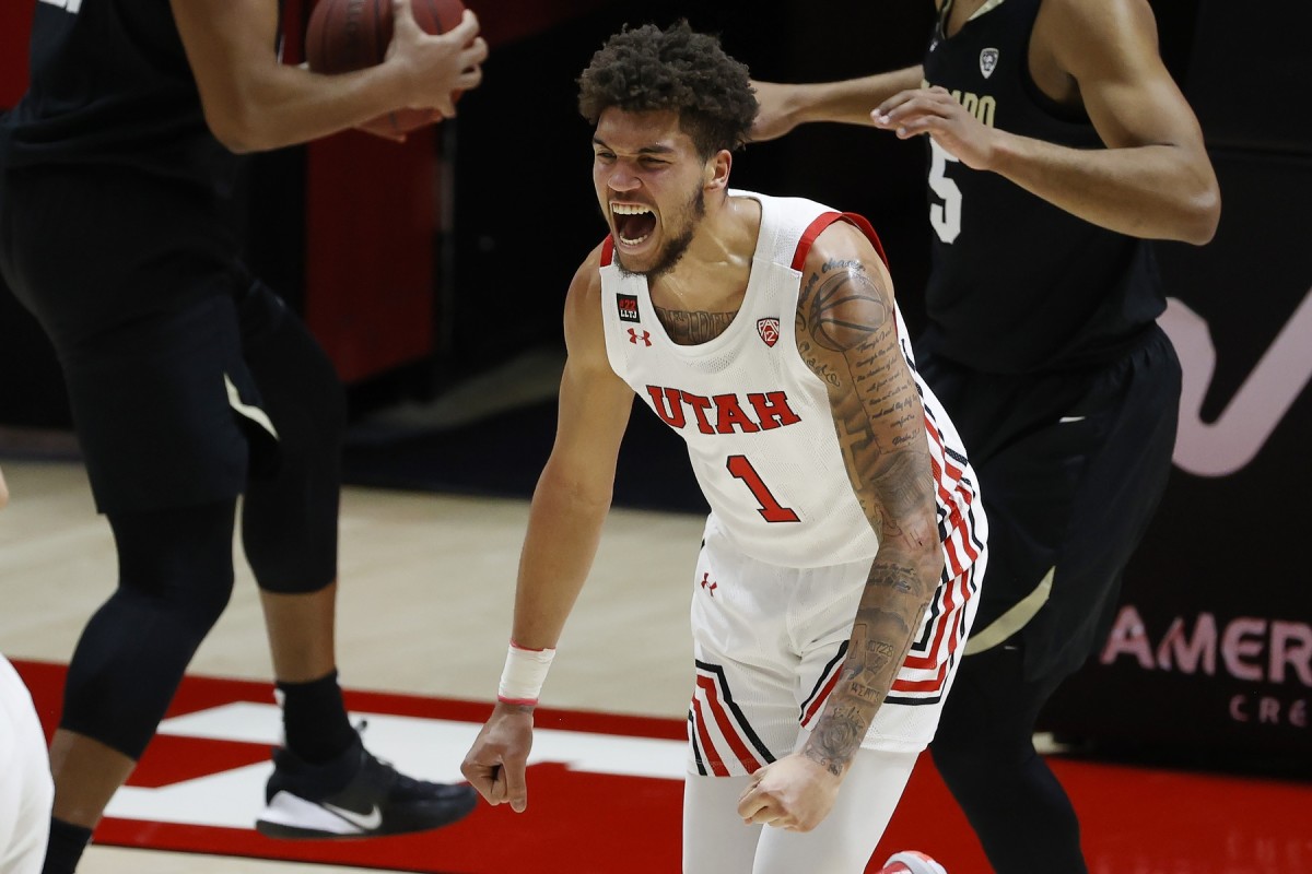 Jan 11, 2021; Salt Lake City, Utah, USA; Utah Utes forward Timmy Allen (1) reacts after a basket in the first half against the Colorado Buffaloes at Jon M. Huntsman Center.