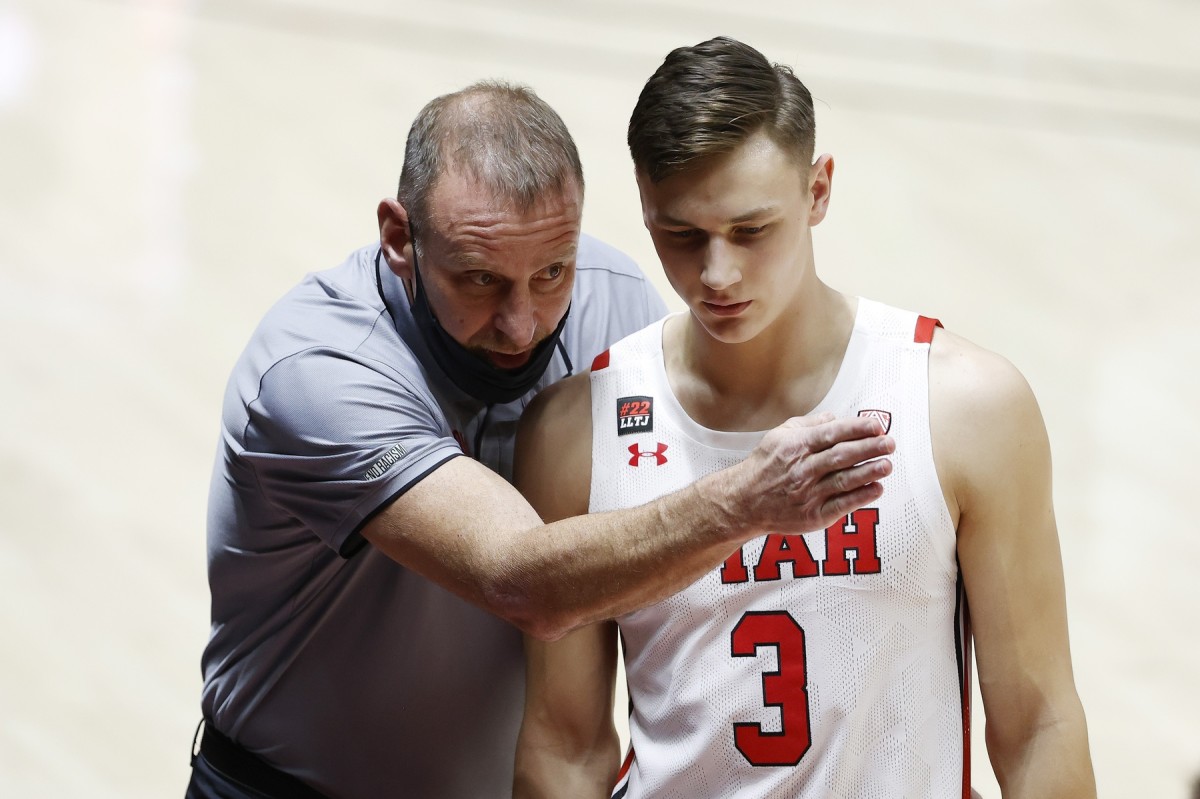 Jan 11, 2021; Salt Lake City, Utah, USA; Utah Utes head coach Larry Krystkowiak instructs guard Pelle Larsson (3) in the first half against the Colorado Buffaloes at Jon M. Huntsman Center.