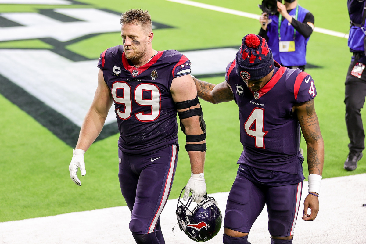 JJ Watt and Deshaun Watson walk off the field after a Texans loss