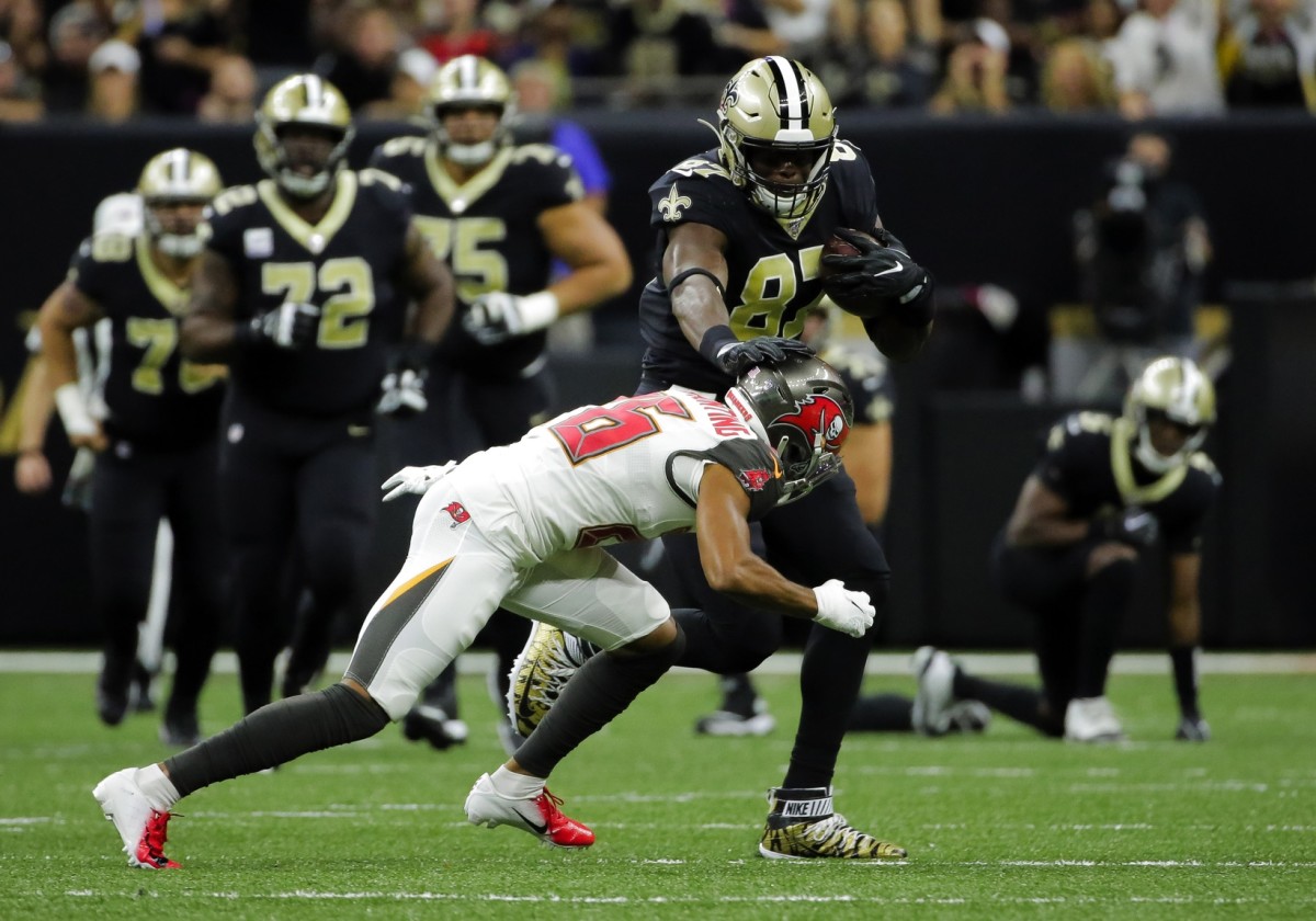 Oct 6, 2019; New Orleans, LA, USA; New Orleans Saints tight end Jared Cook (87) is tackled by Tampa Bay Buccaneers defensive back Sean Murphy-Bunting (26) during the first quarter at the Mercedes-Benz Superdome. Mandatory Credit: Derick E. Hingle-USA TODAY 