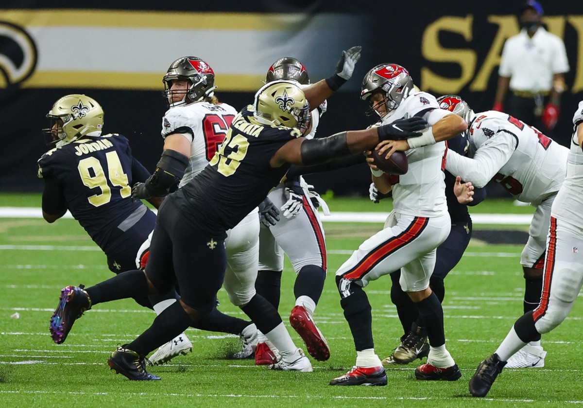Sep 13, 2020; New Orleans, Louisiana, USA; Tampa Bay Buccaneers quarterback Tom Brady (12) is pressured by New Orleans Saints defensive tackle David Onyemata (93) during the fourth quarter at the Mercedes-Benz Superdome. Mandatory Credit: Derick E. Hingle-USA TODAY 