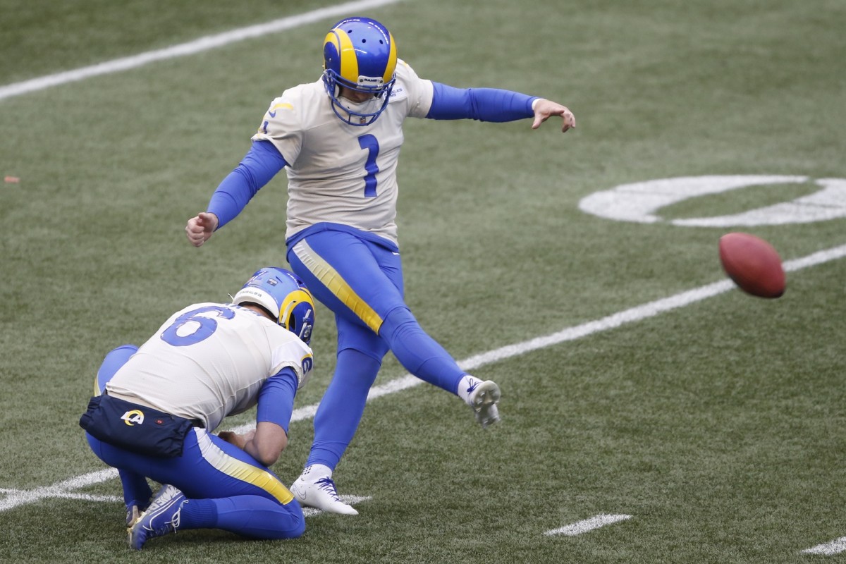 Jan 9, 2021; Seattle, Washington, USA; Los Angeles Rams place kicker Matt Gay (1) kicks field goal against the Seattle Seahawks during the second quarter at Lumen Field.