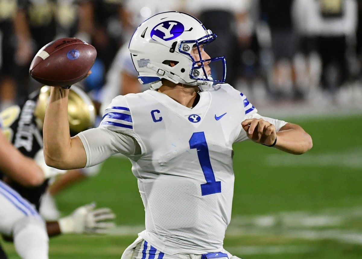 Brigham Young Cougars quarterback Zach Wilson (1) attempts a pass against the UCF Knights during the first half at FAU Stadium.