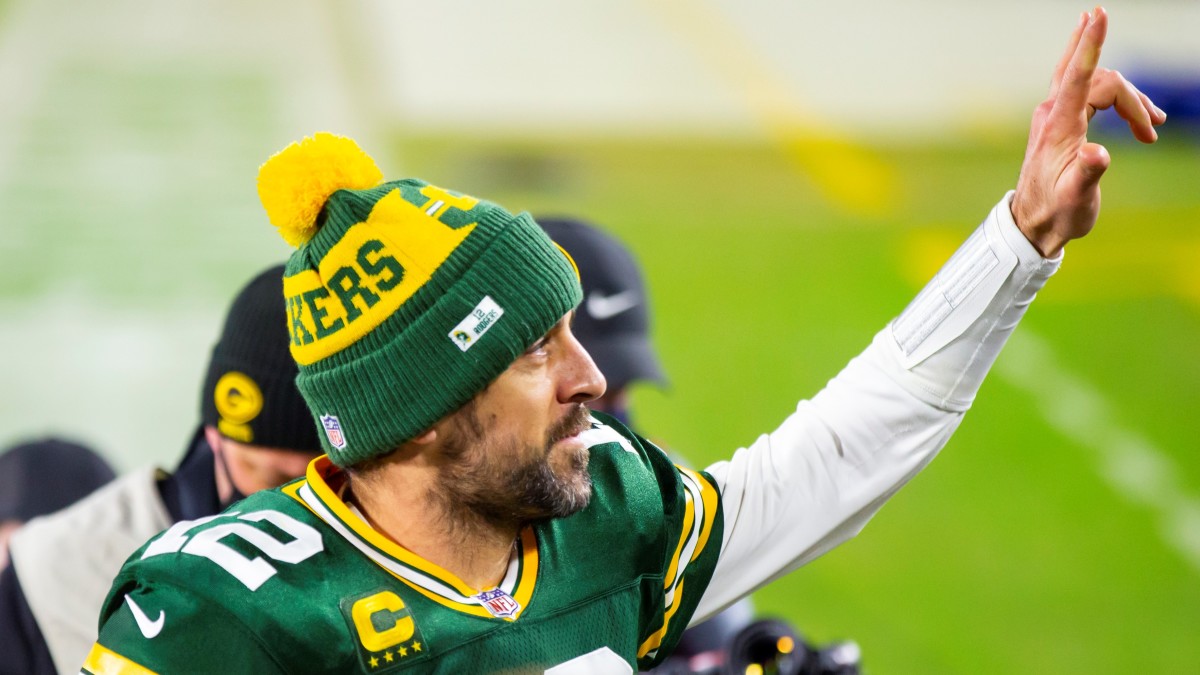 Aaron Rodgers salutes the fans following the playoff victory over the Rams. Rodgers and Co. will host the Buccaneers on Sunday for a trip to the Super Bowl. (Image: Mark J. Rebilas/USA TODAY Sports)