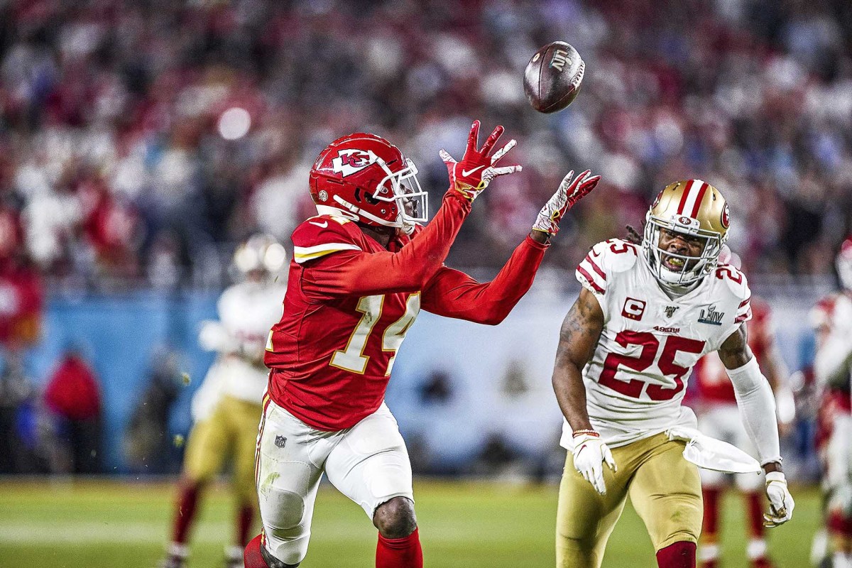 The Chiefs' Sammy Watkins catches a pass over the 49ers' Richard Sherman in Super Bowl LIV