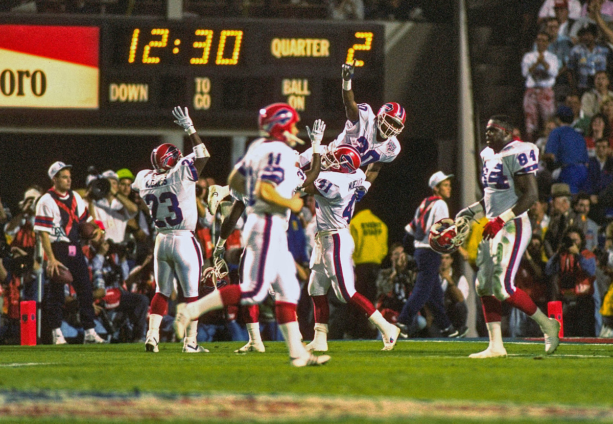 The Buffalo Bills celebrate a play in the first half of their Super Bowl XXV loss to the Giants