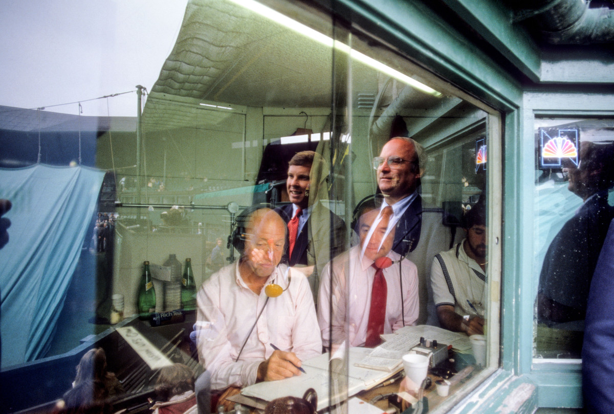 Ax, top right, covering Wimbledon for NBC Sports in 1982 with (bottom row, from left) Bud Collins and Dick Enberg.
