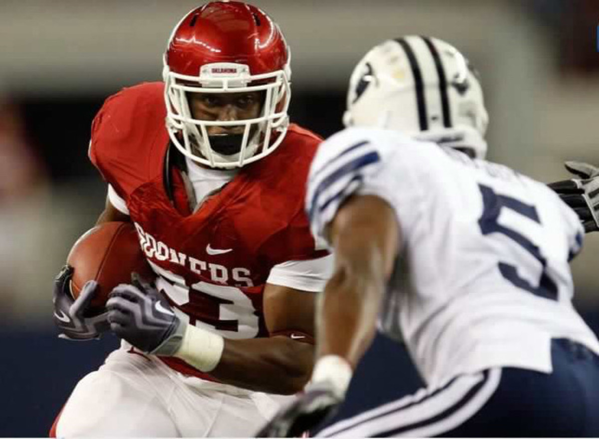 OU running back Jerami Calhoun carries the ball in the 14-13 loss to the BYU Cougars
